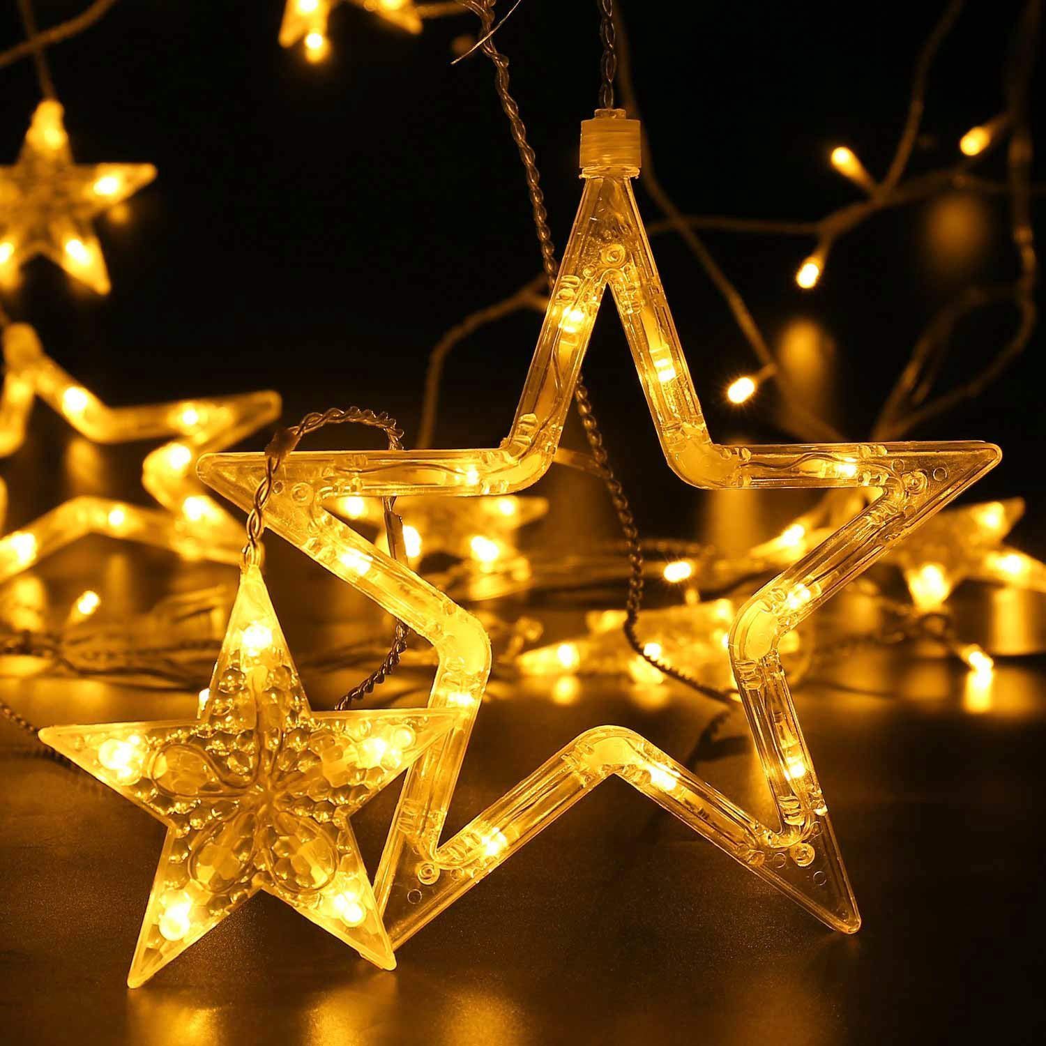 Quntis 138 LED 12-Estrella Conectable 6.5ft Cortina Luces de Navidad – 8 Modos Intermitentes, Decoración de Vacaciones en Blanco Cálido para Navidad y Iluminación Festiva